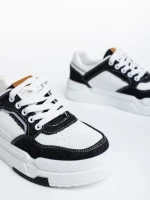Дамски спортни обувки  черни  с бяло от еко кожа Tasnia